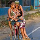 Couple with Baby on Bike - Coaster
